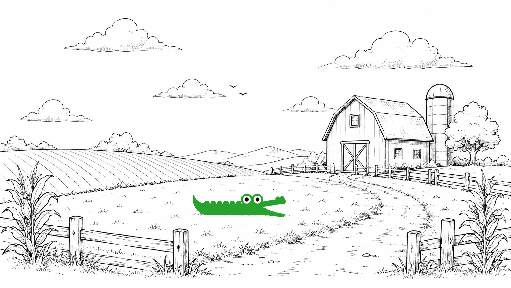A snake resting in a farm field beside a barn